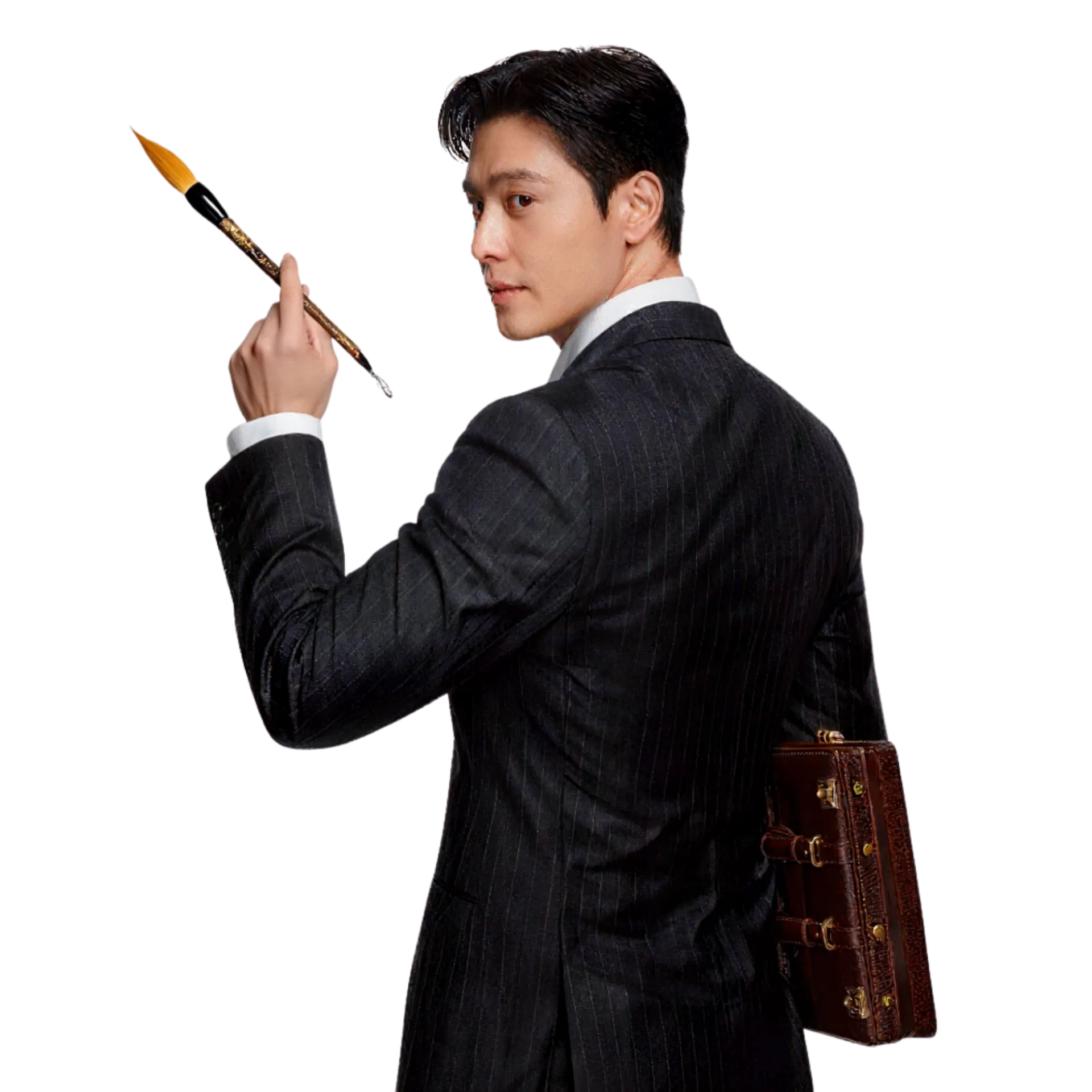 Presenter holding a paintbrush beneath Where Moments Become Masterpieces